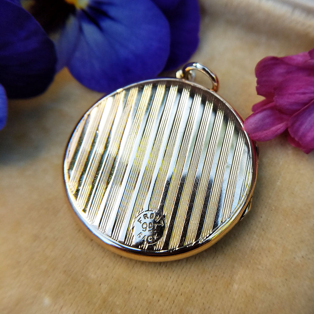 back of Edwardian gold front and  back locket