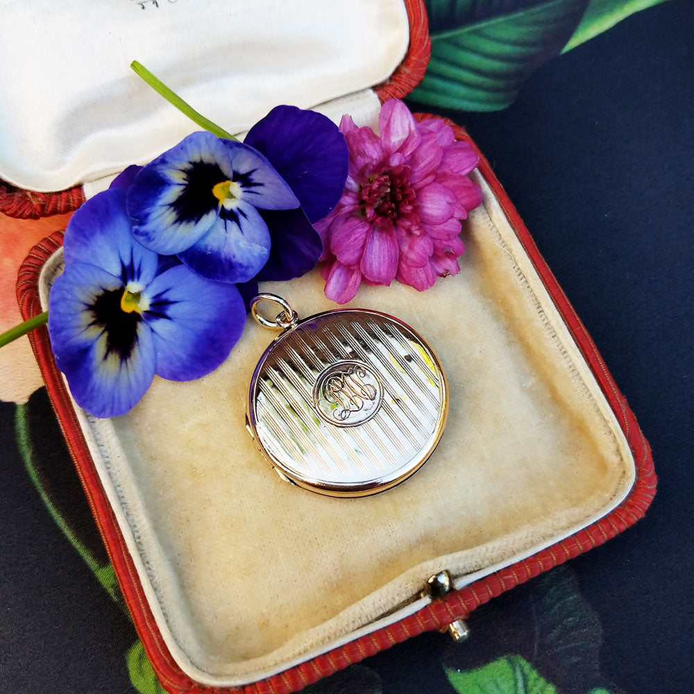 monogram to front of vintage gold locket
