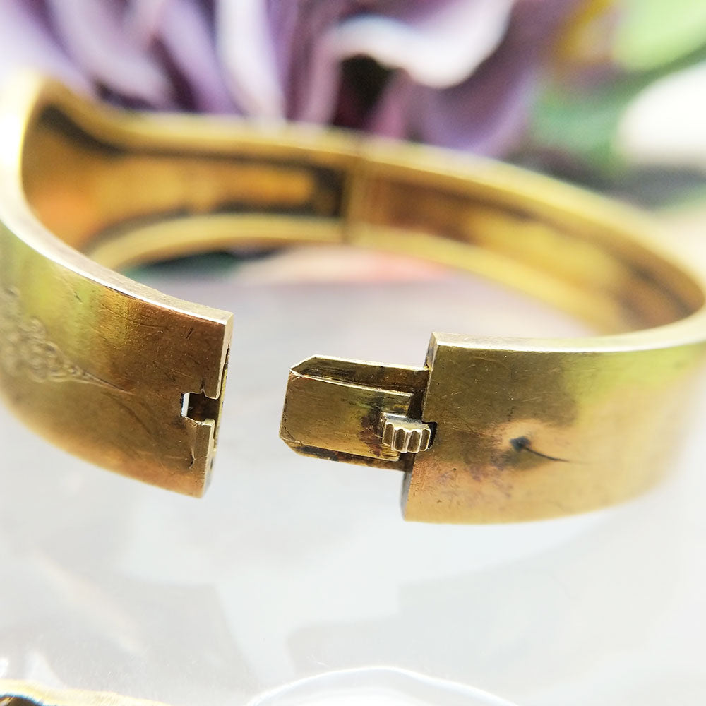 secure catch mechanism on antique gold bangle