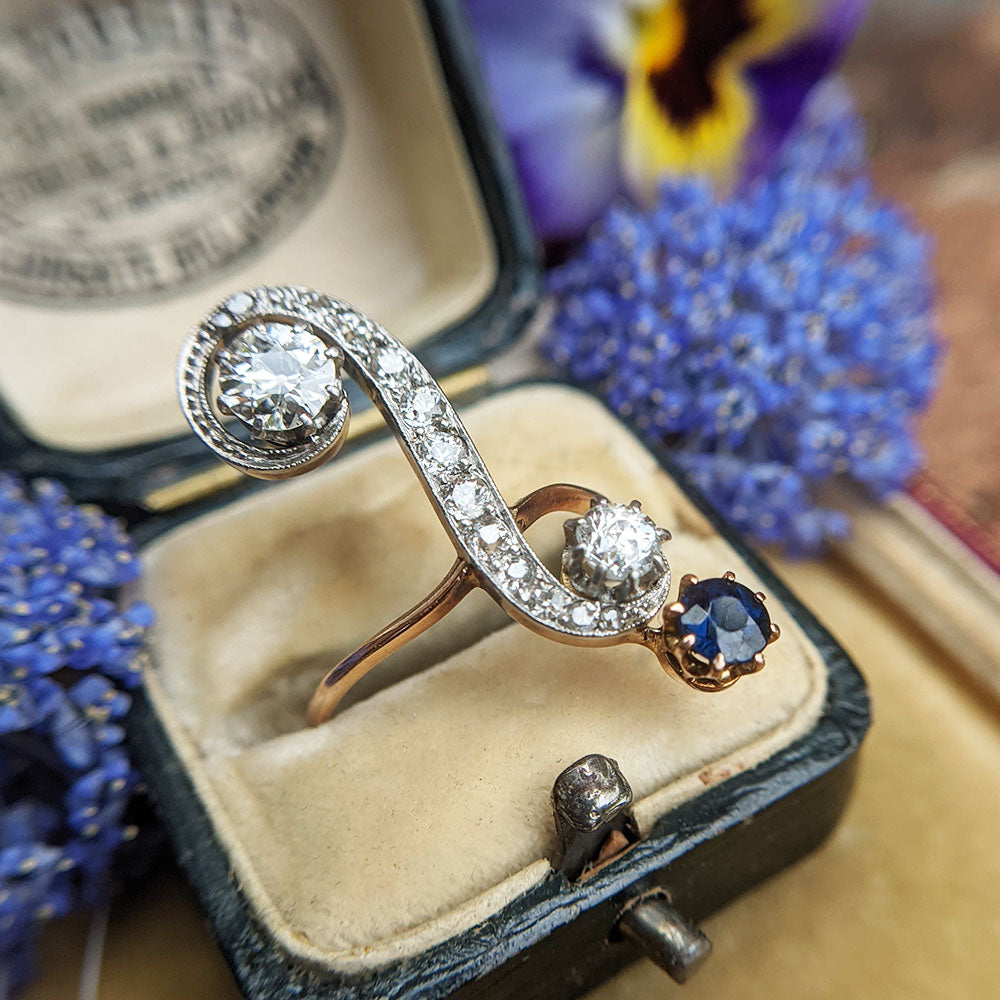 statement upfinger ring with diamonds and sapphire